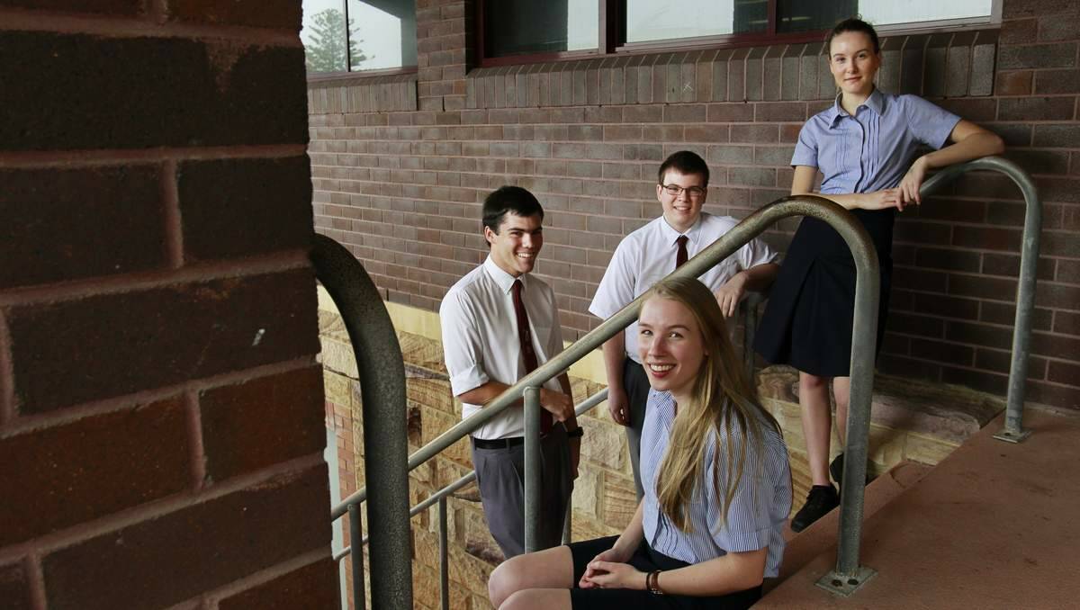 Newcastle Grammar School year 12 students doing the HSC next week. At front Claudia Lloyd Hensley, at back from left Ethan Moroney, Lachlan Deveridge, and Sophie Leitch. Picture by Max Mason-Hubers 