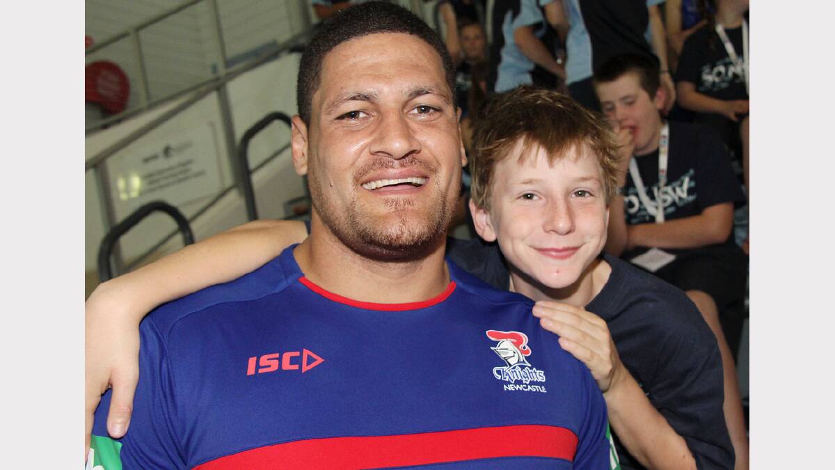Newcastle Knights' Willie Mason with Joe Smith. Picture: Peter Muhlbock / Special Olympics Australia
