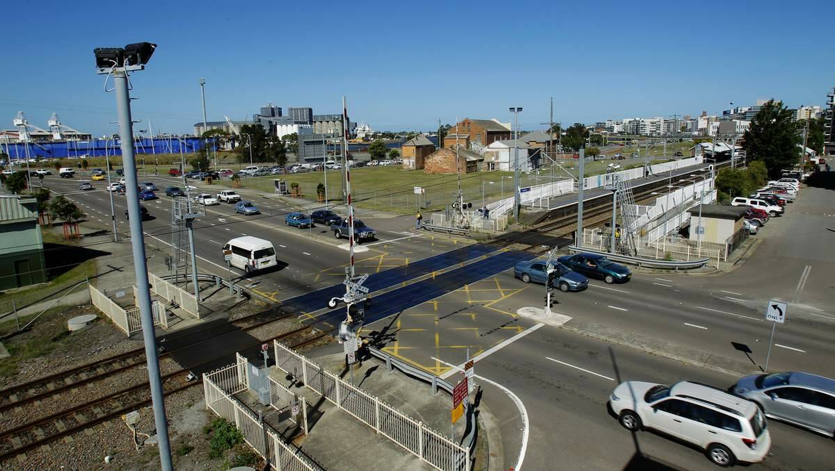 OPINION DIVIDED: The rail crossing on Stewart Avenue and Wickham train station. Picture: Max Mason-Hubers
