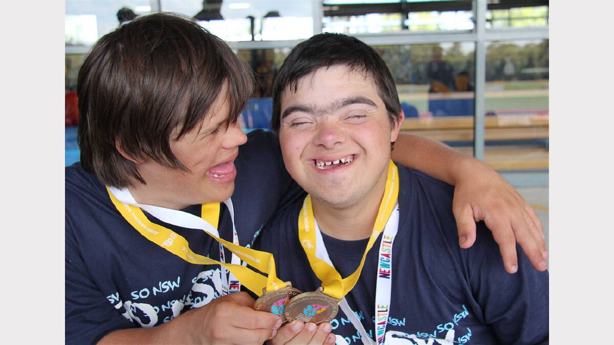 NSW athletes and new best mates, Sam Stubbs and Jordan Cabrita after winning gold in cricket. Picture: Peter Muhlbock / Special Olympics Australia