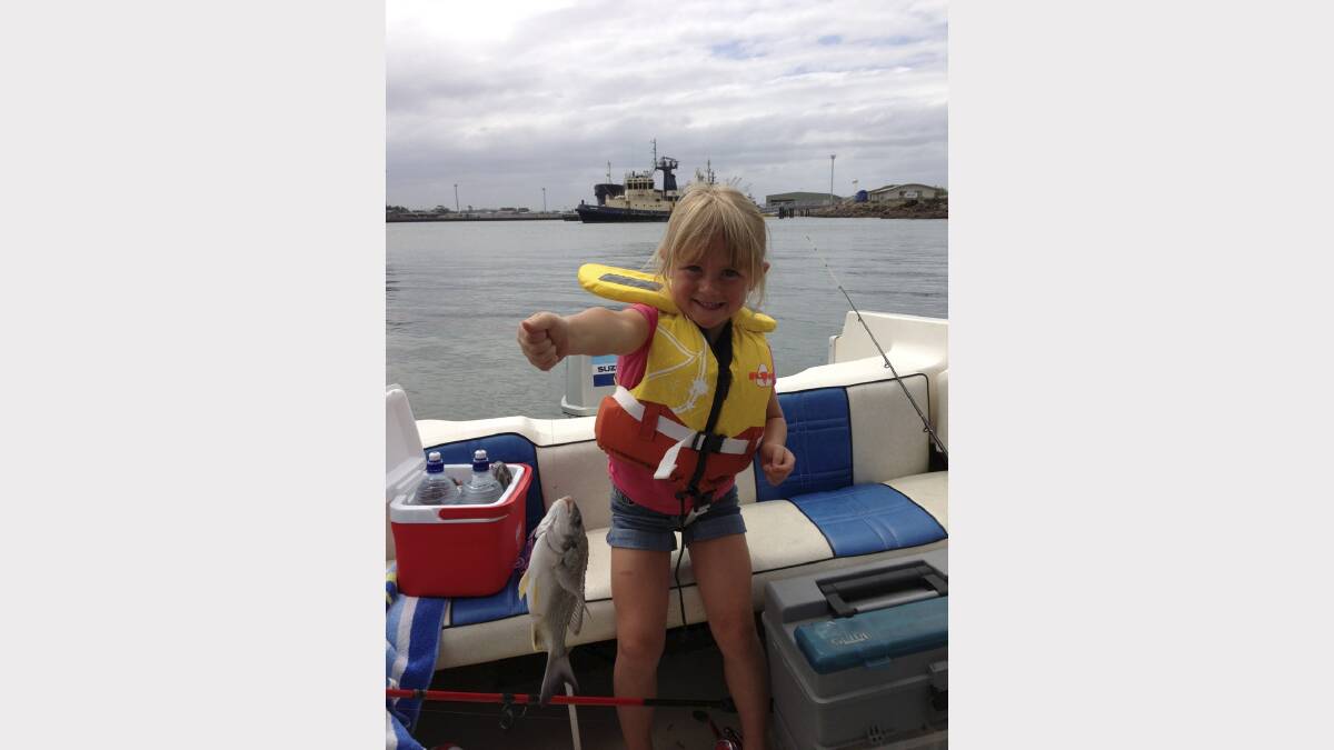 CUTE: Andrea Harvie, aged 5 caught this bream while fishing with her Dad, Greg, in Newcastle Harbour.  It weighed 500gm and was 27cm long.  She baits, casts and lands all her own catches. Submitted 18/01/13