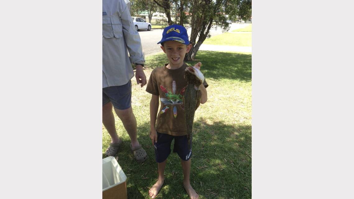 DEBUT: James Lole, 8, landed his first 50cm flathead at the Dropover in Lake Macquarie.