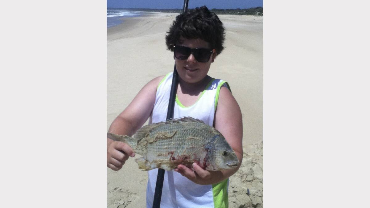 HOLIDAY HUNTER:  Kurt Ryan, aged 11 years, and his 45cm bream hooked off Crowdy Beach.