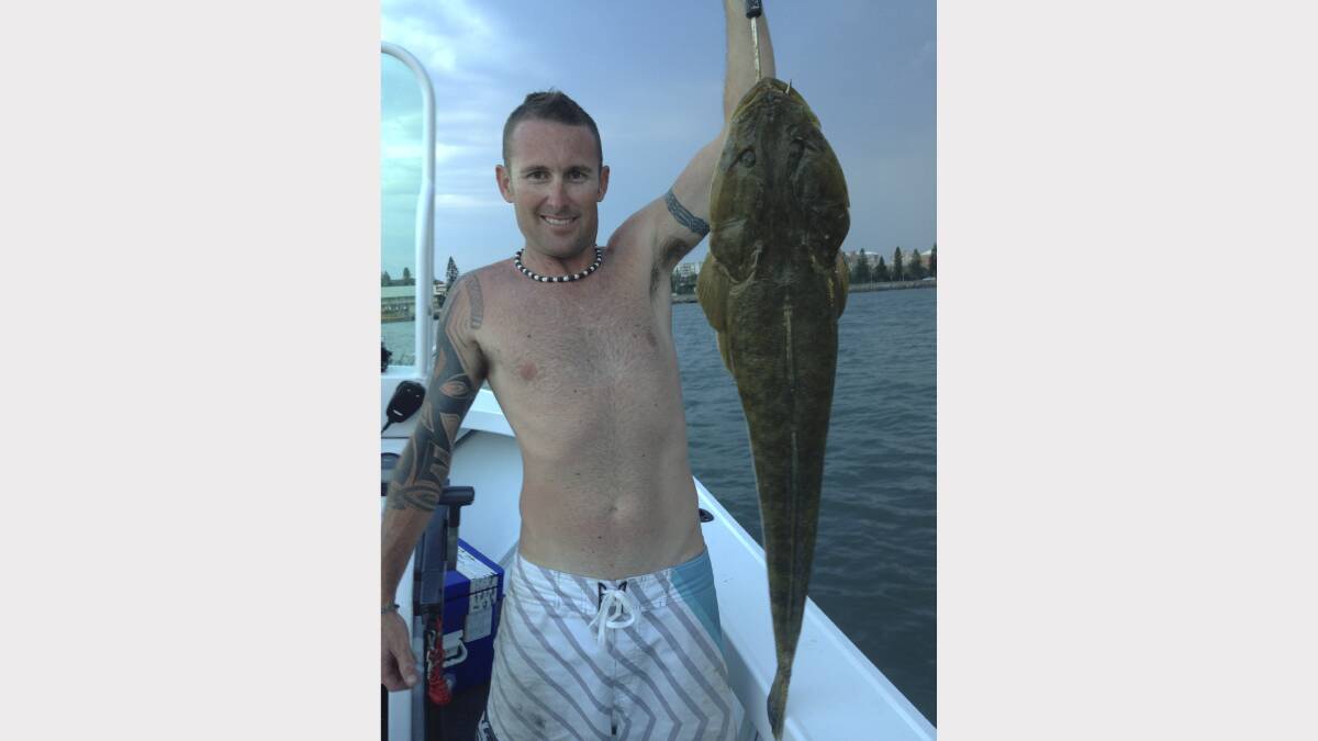 ROCKIN’: Mick Stone caught this 6kg flat head while Jew fishing in Newcastle harbour. Submitted 19/01/13