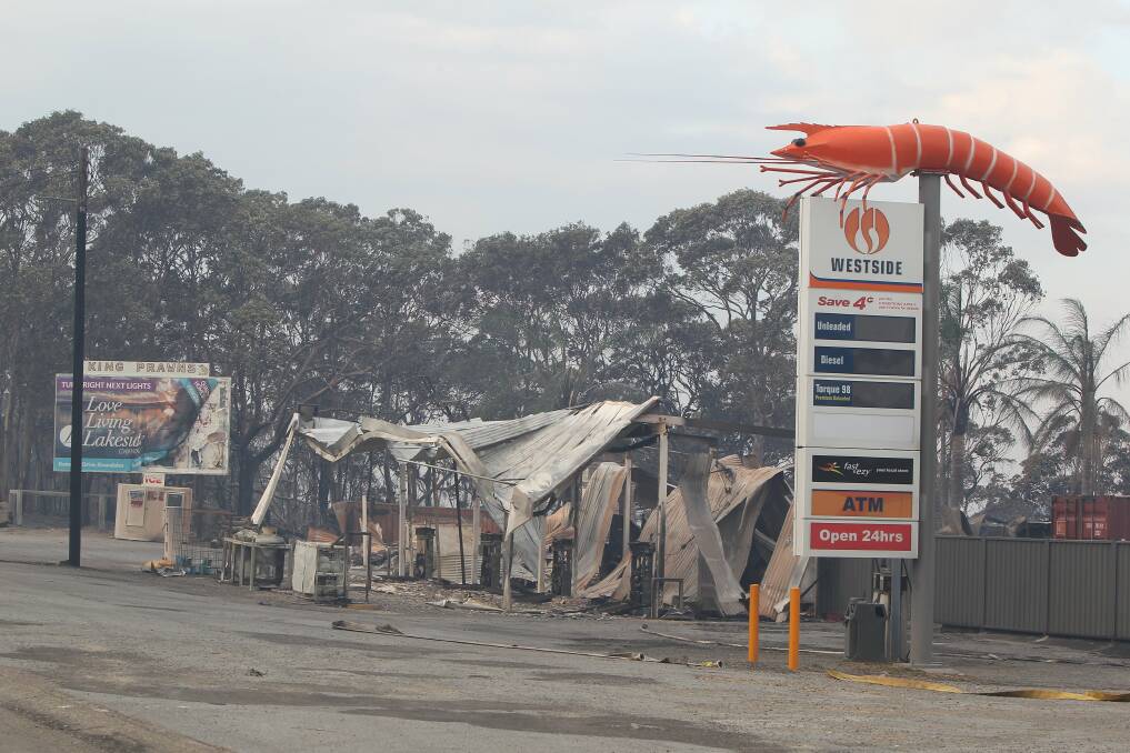 The razed roadhouse and the Big Prawn. Picture: Peter Rae