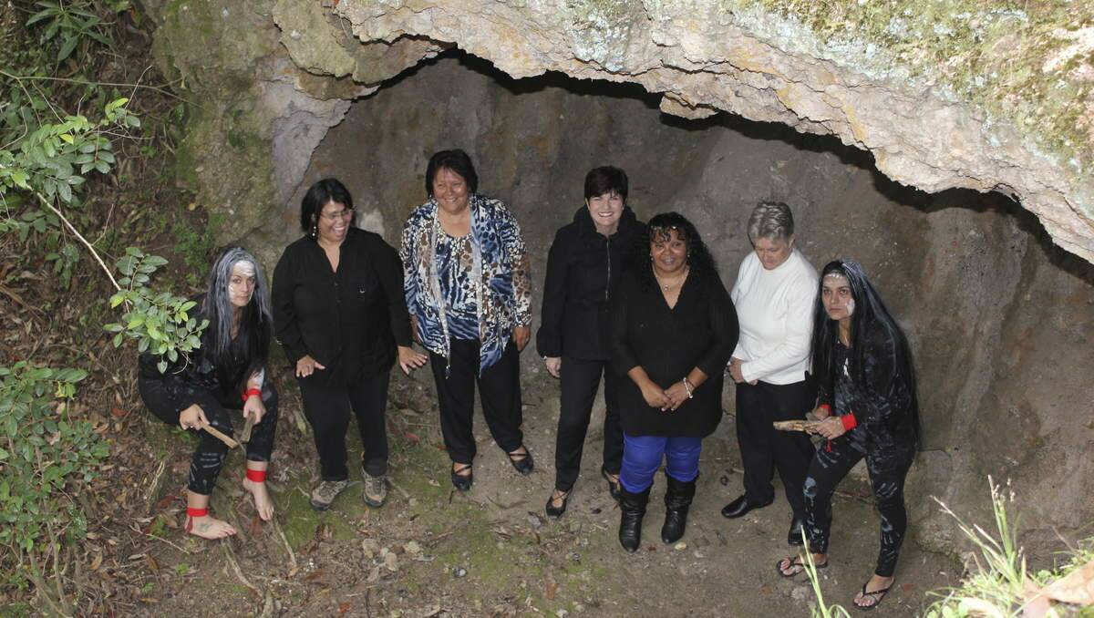 Environment Minister Robyn Parker being shown the Butterfly Cave by Awabakal women.