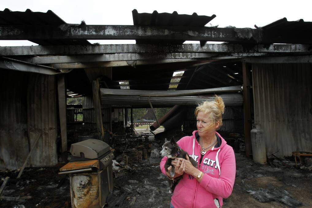 Michelle Byrne, whose home dog grooming business burnt down along with the family's shed on Cabbage Tree Road, Williamtown. Picture: Max Mason-Hubers