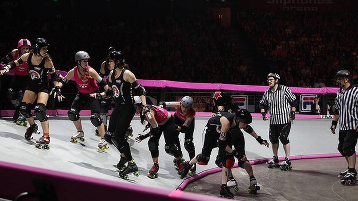 The referees keep a very close eye on proceedings. Photo: Danielle Smith