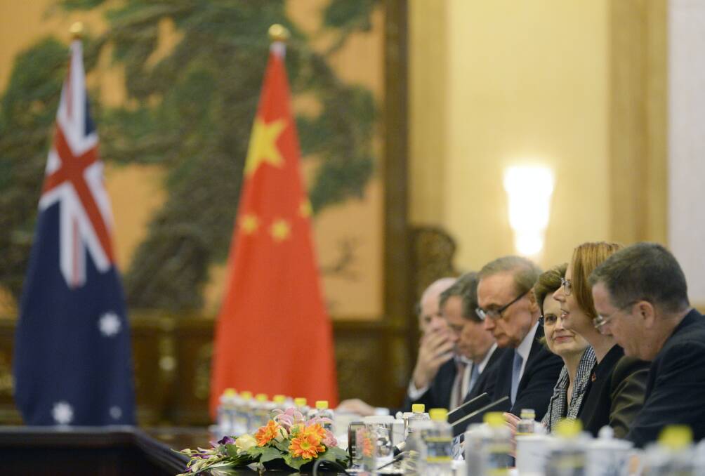 Australian Prime Minister Julia Gillard talks with Chinese Premier Li Keqiang during a meeting at the Great Hall of the People on in Beijing, China. Photo: Getty Images