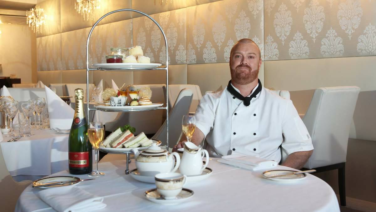 Chef Aaron Campbell with High Tea now at Hobart's Restaurant at  Wests New Lambton. Photo: Phil Hearne