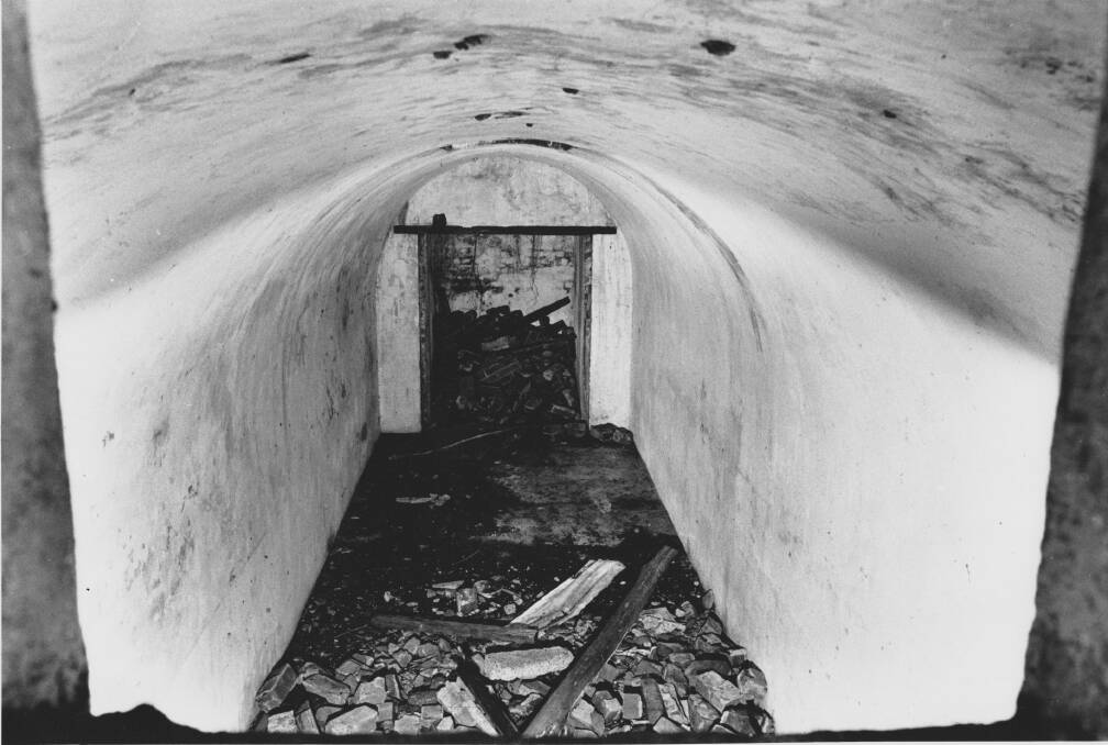 A rare picture of one of the unknown curved ceilinged dairy cool rooms hidden under turf at Minmi's former model farm in 1987. Picture - Mike Scanlon